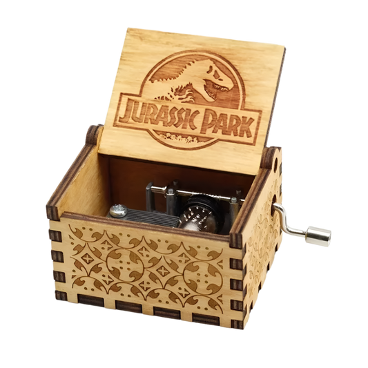 Engraved wooden music box with dinosaur motif, plays the Jurassic Park theme by John Williams.