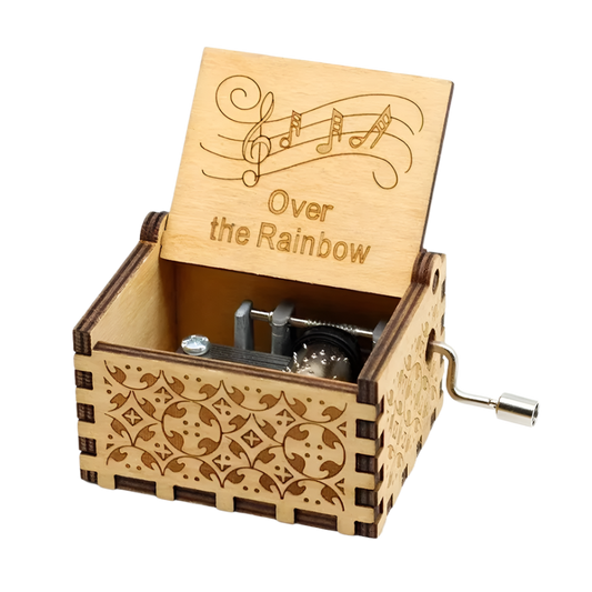 Vintage-style wooden music box, plays "Over the Rainbow" by Judy Garland from The Wizard of Oz.
