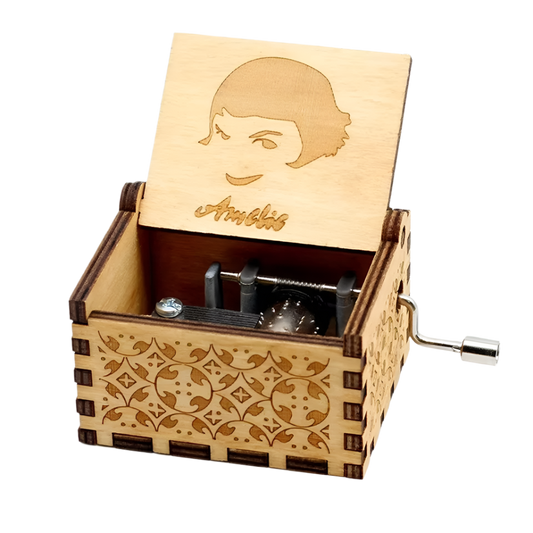 Whimsical wooden music box featuring Amélie-inspired engraving, plays "Comptine d’un autre été" by Yann Tiersen.